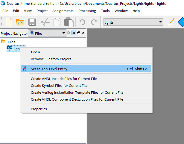 Right click a file name, then select Set as Top-Level Entity